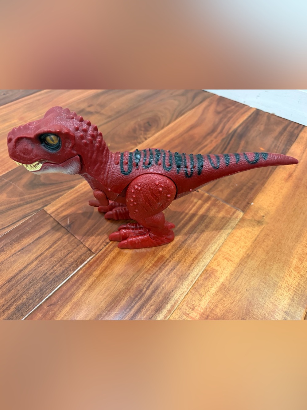 Dinosaur toy - jurassic world red colored